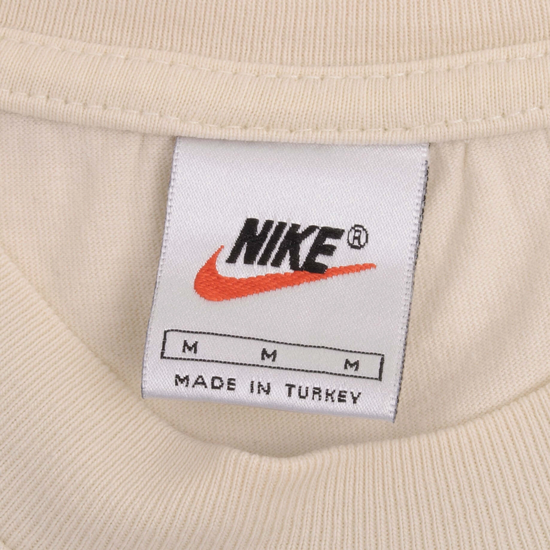 VINTAGE NIKE CLASSIC SWOOSH BEIGE TEE SHIRT 1990S SIZE MEDIUM